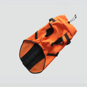 Bright orange All-Weather Reflective Dog Jacket with Built-In Harness and black straps.
