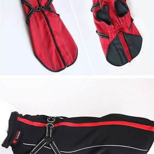 Red all-weather reflective dog jacket with built-in harness and adjustable fit.