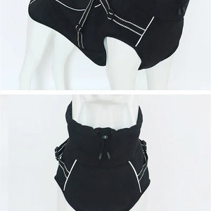 All-weather reflective dog jacket with built-in no-pull harness; black with white piping, windproof and waterproof.